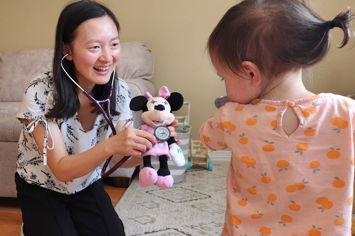 Home visit with doctor and baby