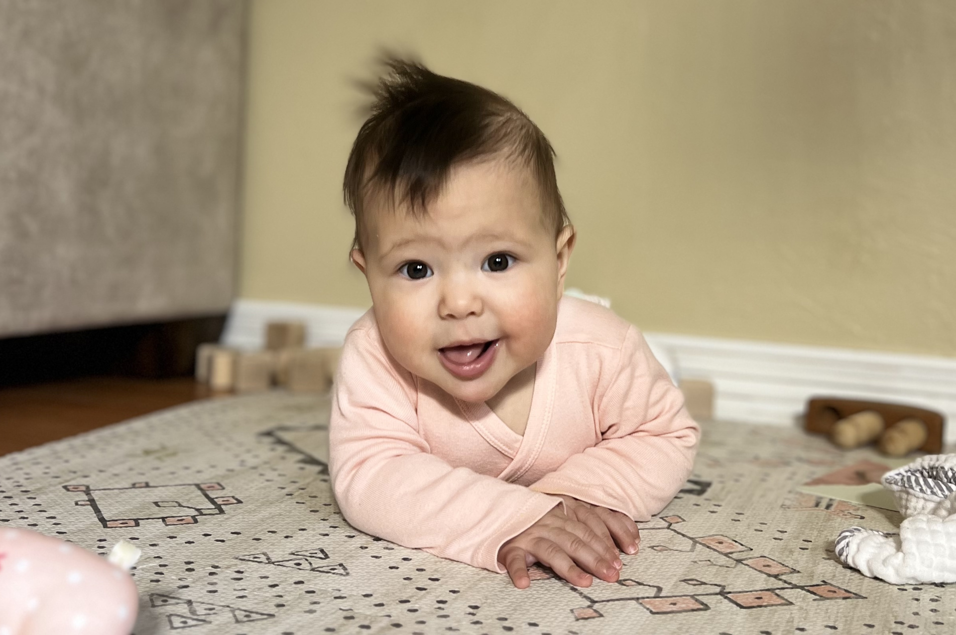 Happy baby smiling at the camera